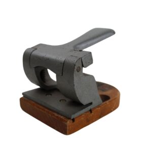 Silver Hole Puncher With Wood Base for TV, Film & Theatre production hire